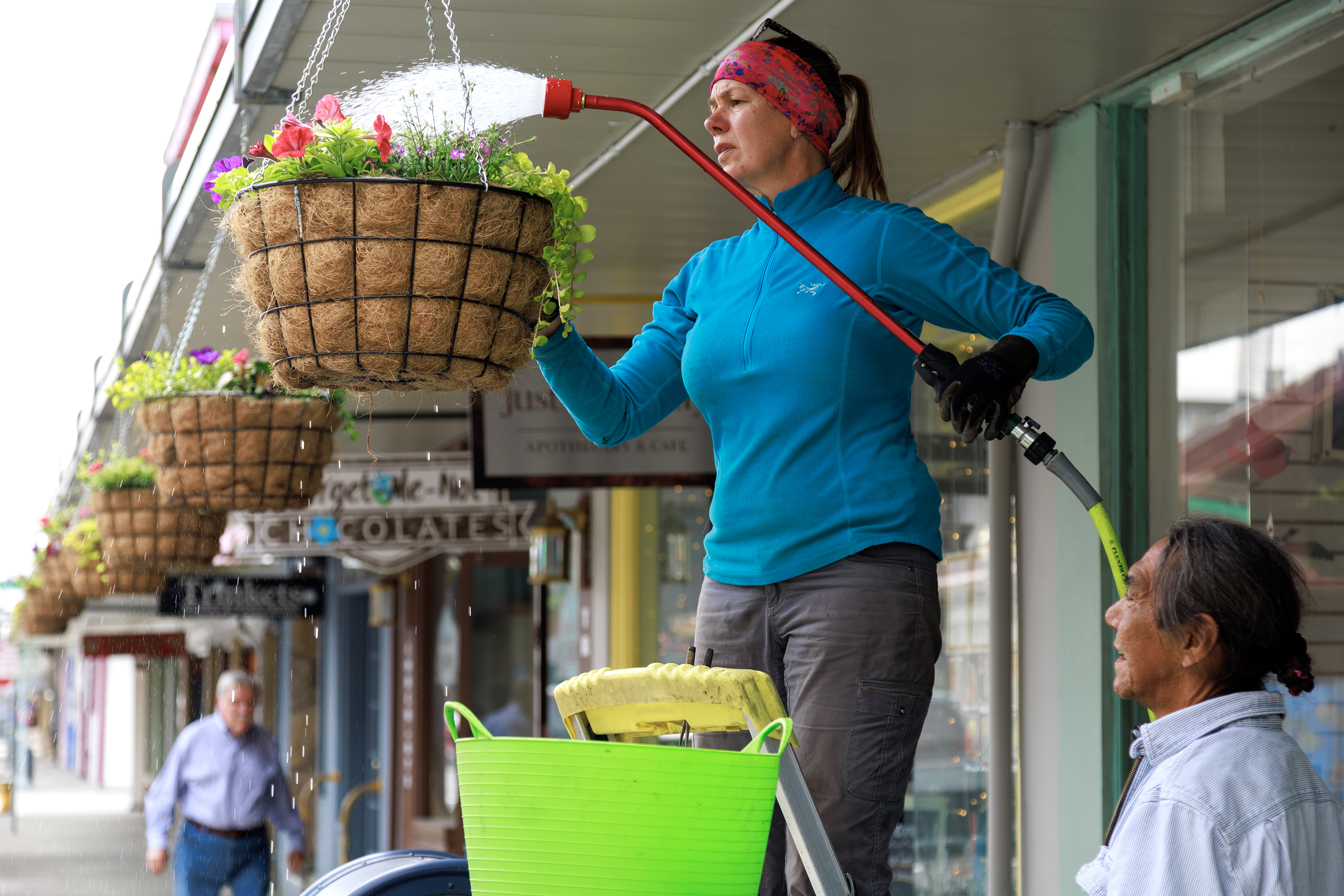 2023 06 09 Watering Flower Baskets
